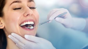 Woman Receiving Dental Checkup